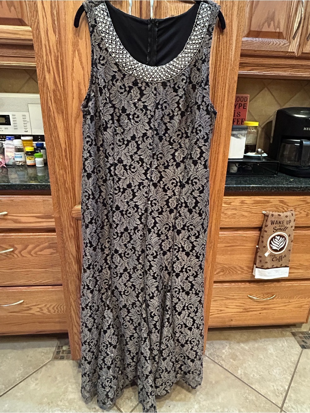 Elegant Black and Silver Lace Maxi Dress with Embellished Neckline